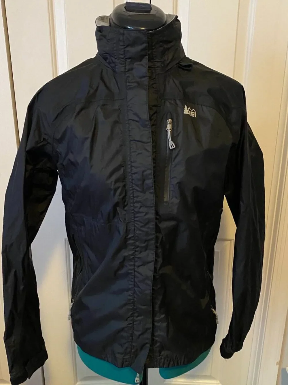 REI black raincoat - Boy's Large